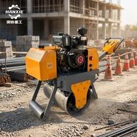 Machine de nivellement et de compactage de chaussées extérieures à roue unique, à moteur thermique, pour travaux d'ingénierie