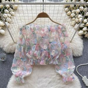 Chemisiers polyvalents pour femmes, coupe ample et amincissante, à une épaule, manches longues, en maille à fleurs 3D, collection été 2026, vente en gros - Product Image 1