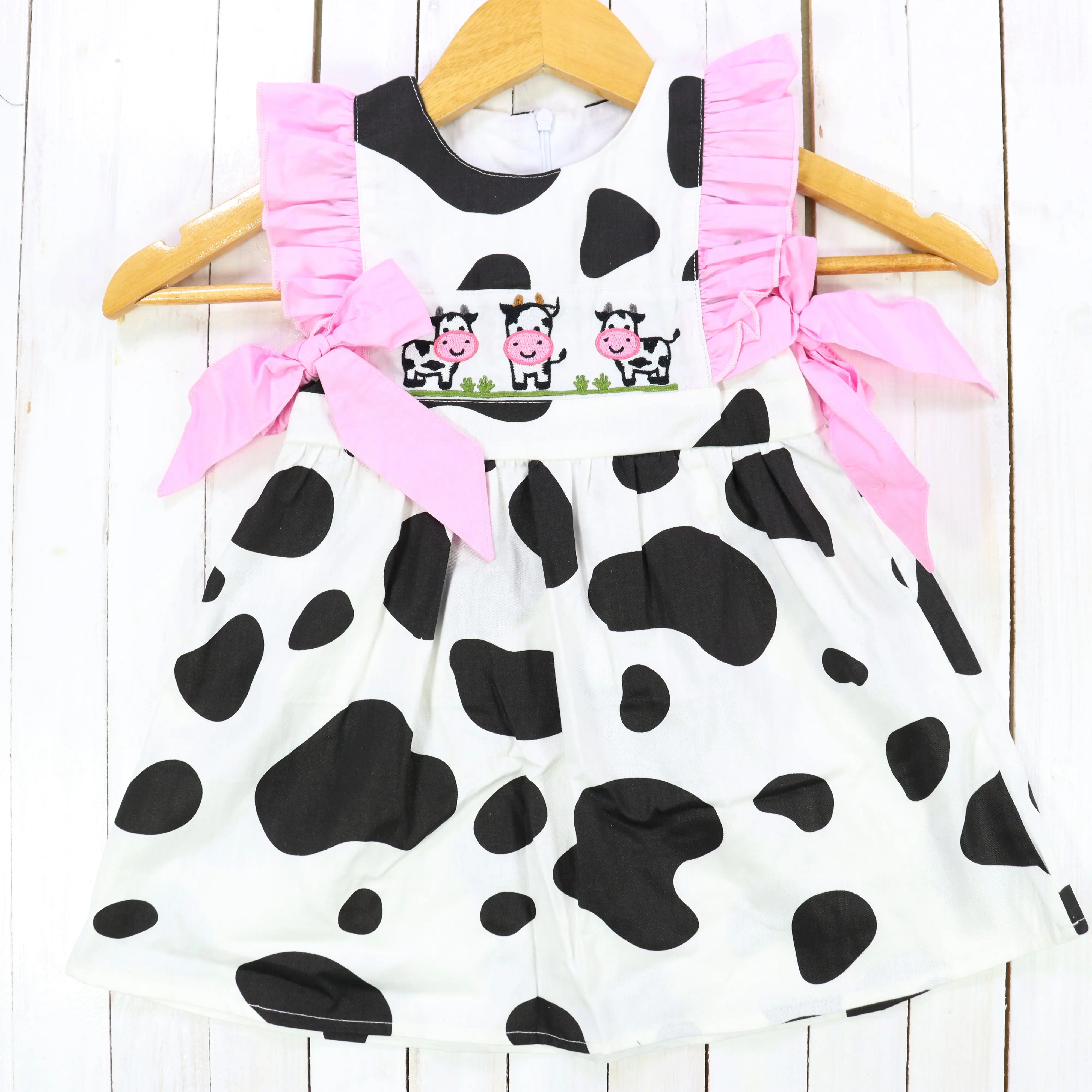 New Arrival Baby Girls Cute Cow Pattern Dress OEM Spring Summer Clothing Embroidered Baby Dress Wholesale With Bows