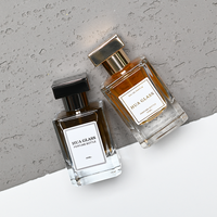 Bouteille de parfum à sertir unique personnalisée pour hommes Bouteilles vides de parfum de 100ml Bouteille de parfum en verre de luxe carrée transparente de 50ml avec bouchon en zamac