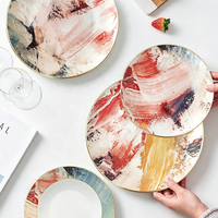Lot de 6 assiettes créatives en céramique abstraite de 6,5 à 12 pouces avec bord doré et présentoir étagé pour hôtels et cafés