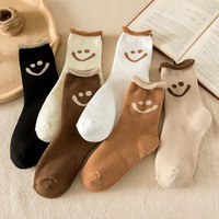 Vente en gros Terry Solide Couleur Curling Femmes Chaussettes Personnalisé Épais Chaud Sourire Sourire Visage Chaussettes