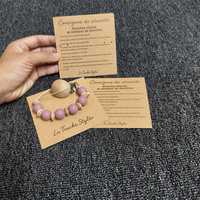 Carte en papier kraft marron personnalisée avec logo pour emballage de clips de sucette et supports de dentition pour bébé