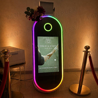 Machine Photobooth Miroir Magique Ovale 60 Pouces avec Écran Tactile 32 Pouces Compatible Appareil Photo Reflex et Impression Instantanée, Cabine Selfie avec Flight Case