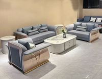 Elegante sofá curvo con diseño de muebles de cuero azul de alta calidad de 123 plazas con laca trasera beige Sofá modular de arte seccional