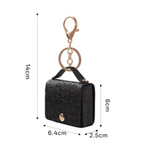 Mini pochette porte-clés en cuir PU au design anime de forme irrégulière, avec fermoir en alliage d'argent, pliable et durable, pour le rangement des AirPods