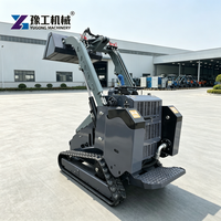 Skid Steer Loader Dengan Bucket dan Garpu untuk Operasi Pemuatan dan Pembongkaran Gudang