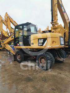 Excavadora de ruedas usada CAT M315D2/317D2 en stock excavadoras de segunda mano a la venta Shanghai Yard - Product Image 6