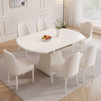 Table à manger ovale extensible moderne en gros, plateau en cuir, pieds en acier, meuble idéal pour gagner de la place dans les petits appartements