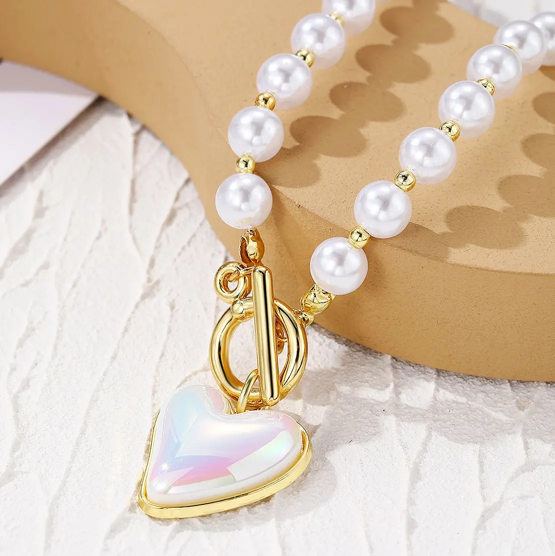Collana Chic ed elegante con ciondolo a forma di cuore di perle e Design a forma di cuore per abbigliamento formale e Casual
