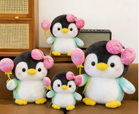 Peluche pingouin mignon avec nœud fraise, jouet en peluche pour machine à griffes, vente en gros, OEM, personnalisable