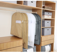 Housse de costume portable pliable en non-tissé transparent, écologique, avec poignée et fermeture éclair, personnalisable avec logo et nom de marque