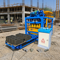 Machine automatique de fabrication de blocs de béton par vibration QTJ4-25, machine à briques creuses, pavés et bordures en béton, machine à blocs de ciment avec PLC