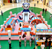 Aire de jeux gonflable géante Hualong à deux zones, de qualité commerciale, pour les enfants, destinée aux parcs urbains