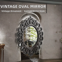 Miroir mural décoratif contemporain personnalisé, orné, unique, écologique, en filigrane sculpté, avec cadre ovale en bois foncé, pour salon