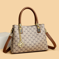 Sac seau de luxe pour femme en cuir léger, portable, imperméable, avec bandoulière, sangle de taille, fermeture éclair et chaînes, grande capacité