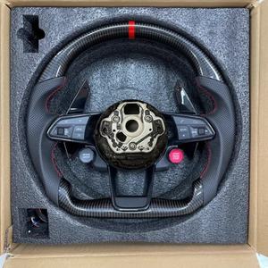 Volant en fibre de carbone semi-perforé avec bouton de démarrage R8 et sélecteur de mode de conduite pour <span class=keywords><strong>Audi</strong></span> A3 A4 A5 A6 C7 C8 Q3 Q5 Q7 SQ5 SQ8 TTRS - Product Image 1