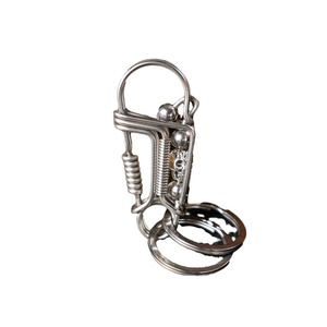 Нержавеющая сталь ручной работы Креативные черепа бисер пружинный брелок мужской автомобиль брелок кулон - Product Image 1