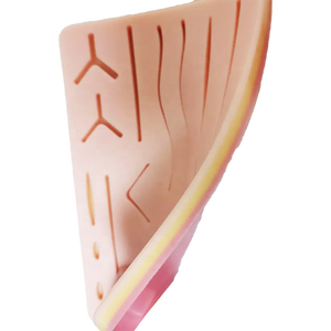 Almohadilla de silicona para sutura de heridas con 14 cortes, modelo de entrenamiento de sutura quirúrgica, modelo de piel humana traumática con cortes predefinidos - Product Image 3