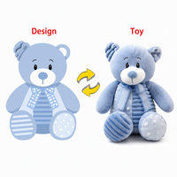Ours en peluche bleu assis, doux et rembourré, avec nœud à carreaux et ventre rayé, pour enfants