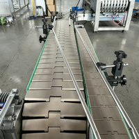 Convoyeur à chaîne plate personnalisable COSINE pour système de production de machines de remplissage avec garantie d'un an