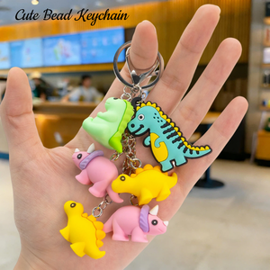 Dinosaur Theme Bestseller 3D Colorful Dinosaur Bead Keychains Bulk Mini Rubber Charms Promotion Gifts Little Bear Keychain