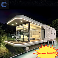 Cabine préfabriquée en acier durable, capsule spatiale, maison mobile de plein air, complexe hôtelier avec cuisine, toilettes, design luxueux pour les touristes