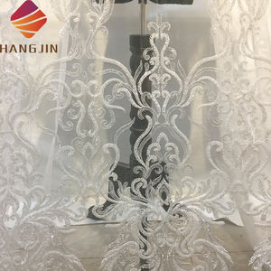 ผ้าลูกไม้ปักเลื่อมเนื้อเ<span class=keywords><strong>น</strong></span>็ตหรูหราสีงาช้างแบบไ<span class=keywords><strong>น</strong></span>จีเรียสำหรับเจ้าสาว ปี 2022 ผ้าลูกไม้ปักลาย 3 มิติ ประดับด้วยลูกปัดอย่างสวยงาม - Product Image 3