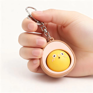 Llavero de simulación con botón de huevo de té, accesorio antiestrés, cara divertida y adorable - Product Image 2