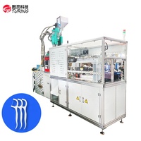 Machine de moulage par injection entièrement automatique pour la fabrication dentaire de bâtonnets de fil dentaire en plastique et de cure-dents