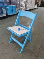 Chaise pliante moderne en résine robuste pour usage commercial, avec siège rembourré, empilable, imperméable, pour jardin, événements, location, assise extérieure