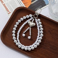 Porte-clés chic pour femme, petit breloque léger en fausse perle, cœur à double chaîne, accessoire de suspension pour sac ou téléphone