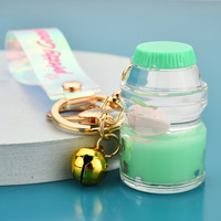 Porte-clés professionnel en acrylique rempli d'huile, mignon en forme de bouteille de glace, avec liquide lumineux, porte-clés liquides personnalisés pour enfants