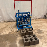 Machine mobile économique à 3 trous pour la fabrication de blocs de béton, de pavés creux en ciment et de briques autobloquantes