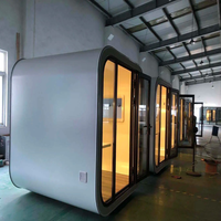 Bâtiment préfabriqué en acier entièrement équipé, type capsule Apple, utilisé comme entrepôt de stockage temporaire