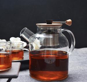 Haute qualité 1000ml petite cuisine <span class=keywords><strong>salon</strong></span> <span class=keywords><strong>de</strong></span> <span class=keywords><strong>thé</strong></span> théière verre clair résistant à la chaleur amovible passoire Design classique <span class=keywords><strong>vaisselle</strong></span> - Product Image 5