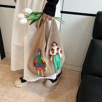 Nouvel arrivage à la mode estivale Sac à main shopping personnalisé mignon pour dame Sac à bandoulière de plage creux pour les vacances en bord de mer avec patch