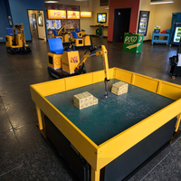 Machine de jeu d'intérieur à pièces pour enfants avec mécanisme de levage magnétique Construction en fibre de verre et métal Garantie 1 an