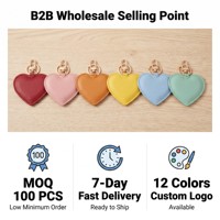 Breloque de sac en cuir PU en gros, porte-clés cœur personnalisé, pendentif mignon pour sac à main, accessoire de sac, petit cadeau, ornement de mode pour femme