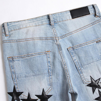 Jean slim bleu pour homme, effet usé, avec patch en cuir personnalisé, en denim extensible, style urbain, logo OEM