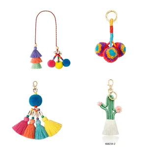 Latest new fashion boho sea beach jewelry handmade pompom tassel shell keychain bag charm