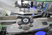 Étiqueteuse double face de bidon de jerrycan de bouteille carrée automatique directe du fabricant/application d'étiqueteuse face avant et arrière