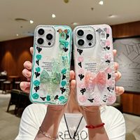Coque de téléphone de luxe antichoc 3D avec nœud papillon et motif tulipe pour A17/A15/A13/A04e avec dragonne papillon – Vente en gros