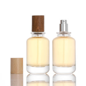 Bestselling 50ml glass perfume <b>bottle</b> refillable cosmetic <b>spray</b> <b>empty</b> <b>bottle</b> with step body and round ball cap for travel - Product Image 2