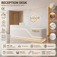 Comptoir de réception minimaliste blanc avec éclairage LED intégré, mobilier de bureau directement de l'usine OEM pour cliniques et cafés