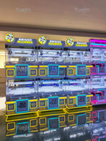 Nouveauté 2026 Mini machine d'arcade d'intérieur à monnayeur pour la distribution de jouets et de cadeaux, Mini machine à griffes pour poupées
