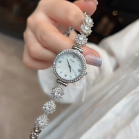 Montre-bracelet Shigaodi ronde de style Ins, élégante et tendance, avec bracelet rotatif incrusté de diamants pour femmes, nacre