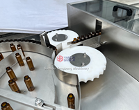 Nettoyeur rotatif de flacons en verre YB-ZX100 pour le lavage des flacons d'ampoules de liquides oraux destinés aux lignes de remplissage