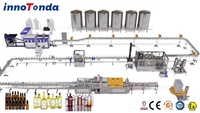 Machine automatique électrique de remplissage, lavage et bouchage de bouteilles de vodka et de vin en verre haute précision