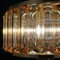 Lustre en cristal en acier Maurier de style nordique américain moderne, hauteur réglable, finition nickel/noir/laiton, garantie 5 ans, éclairage